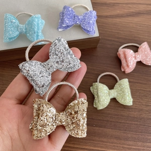 Élastiques à cheveux avec nœuds pailletés pour filles en plusieurs couleurs brillantes