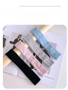 Four-color set of ribbed knit elastic sports headbands in black, pink, grey, and blue