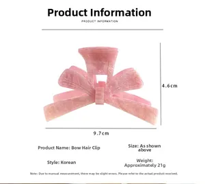 Pink marble acetate bow hair claw clip measuring 9.7cm length and 4.6cm height