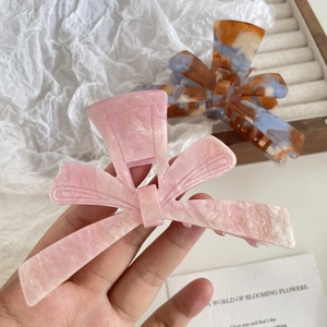 Elegant acetic acid bow hair claw clips with marble texture patterns for women hairstyles