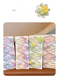 Detail of colorful gradient cartoon hair clips including bear, rabbit and heart shapes