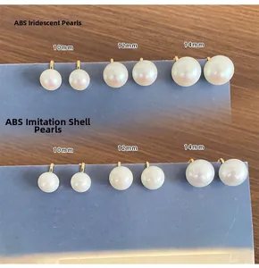 Macro view of ABS imitation pearls in 10mm 12mm 14mm sizes with golden metal bases