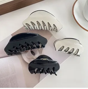 Classic French acetate hair claws in black and beige, large and small size set