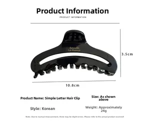 Detail view of a black 10.8cm hair claw clip with golden lettering and precise dimensions