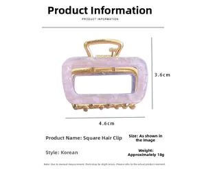 Detailed view of square acetate hair claw with lavender marble pattern and gold metal teeth
