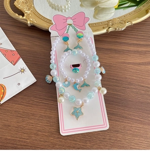 Kids ocean jewelry set featuring starfish pendants and pearls on a display card