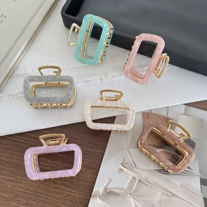 Set of 6 colorful acetate square hair claws with elegant marble patterns and gold metal clips