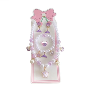 Children's ocean themed jewelry set with pearl necklace, bracelet, ring and starfish clips