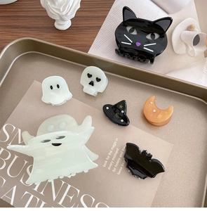 Detailed set of Halloween acetate hair clips featuring ghosts, bats, and skulls