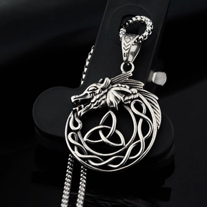 Vintage silver dragon pendant necklace with Celtic knot design and metal bead chain