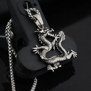 Vintage silver dragon pendant on a robust box chain necklace for men and women