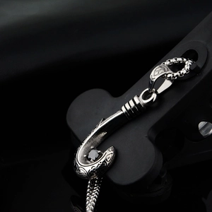Hip hop titanium steel necklace featuring a vintage silver fishhook pendant with black stone