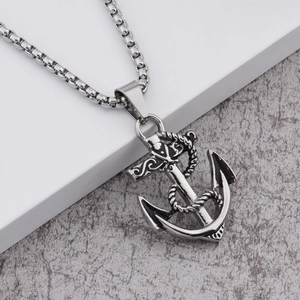 Nautical anchor pendant necklace with skull detail and square box chain in vintage silver