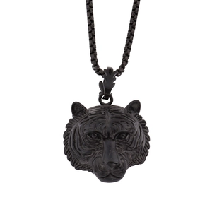 Detailed close-up of a matte black tiger head pendant featuring a stainless steel box chain
