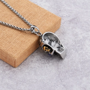 Collier crâne hip hop avec mini crâne doré sur une chaîne en blé pour hommes et femmes