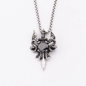 Gothic sword and twin snake pendant necklace with a large black round faceted gemstone