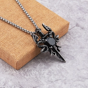 Gothic sword pendant necklace with dragon wings and a faceted black gem in high-quality steel