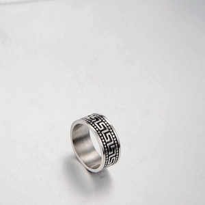Hip hop titanium steel ring featuring Greek key pattern and beaded edges in silver finish