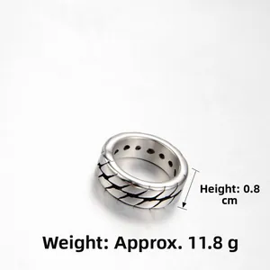 Macro detail of men's titanium steel ring with textured weave pattern, 0.8cm width