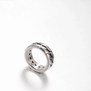 Vintage industrial silver stainless steel ring with carved chain pattern and inner hole details