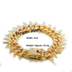 Detail of 2cm wide gold hip hop thorn bracelet with sparkling pave zircon micro-inlay