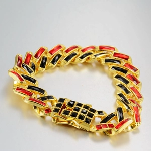 Hip hop cuban chain bracelet in gold finish with red and black rectangular stones