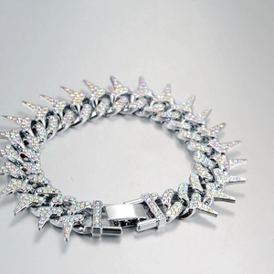 Hip-hop silver thorns bracelet with rainbow micro-pave zircons shown from 45-degree angle