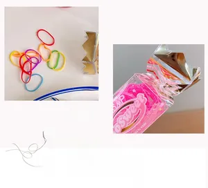 Close-up of colorful high-elastic hair ties in a decorative gold crown top gift box