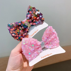 Sparkly sequins bow hair clips for girls featuring colorful and pink mesh designs
