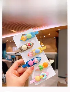 Set of six colorful dessert-themed seamless hair clips with cute cartoon pastries