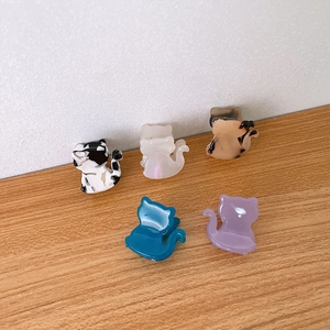 Set de cinco mini pinzas de pelo de acetato con forma de gato para niñas en varios colores