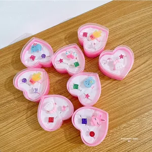 Set of 8 heart-shaped gift boxes containing colorful cartoon and gemstone rings for girls