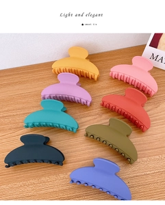 Detailed set of 8 matte large hair claws in assorted elegant low-saturation colors