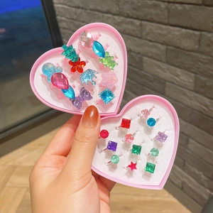 Kids princess jewelry set featuring colorful gemstone rings in a pink heart-shaped box