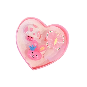 Kids jewelry set with three cute resin rings in a pink heart-shaped display box