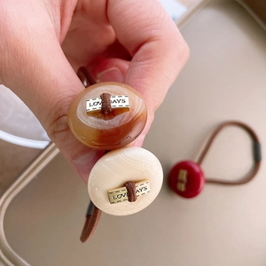 Elastic hair ties with amber resin button and Love Days engraving for women