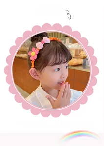 Detail of girls floral headband featuring anti-slip teeth for secure and comfortable fit