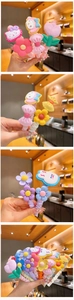 Detailed view of colorful 3D resin cartoon flowers and bows on fabric-covered headbands