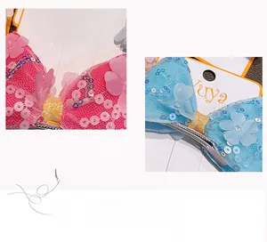 Détails rapprochés de barrettes à nœud pour filles avec paillettes et fleurs en tissu