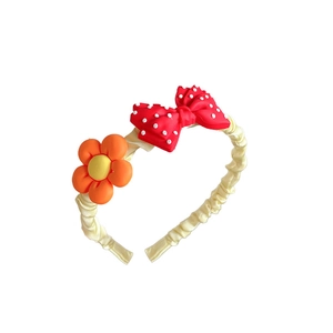 Sweet girls' floral headband with red polka dot bow and sunflowers on beige satin band
