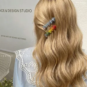 Sweet candy-colored heart bead hair clips set shown on model with aesthetic style