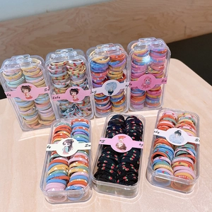 Coffret de mini élastiques à cheveux pour bébés avec motifs colorés et boîtes