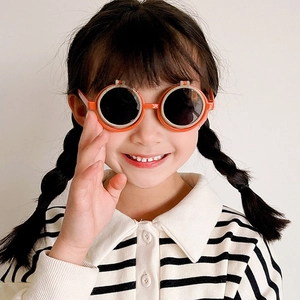 Occhiali da sole rotondi arancioni a scatto per bambini con protezione UV