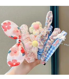 Detailed view of floral hairband set with mesh bow and cute cartoon character designs