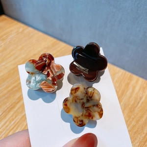 Three-piece floral mini hair claws in amber tortoiseshell and solid brown handmade acetate