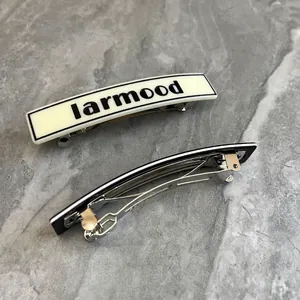 French vintage acrylic hair clip set in black and white with metal spring mechanism