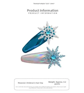 Detail showing two blue princess snowflake hair clips with glitter finish and gemstones