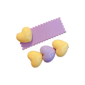 Lot de barrettes colorées en forme de cœur avec rectangle violet et accents jaunes