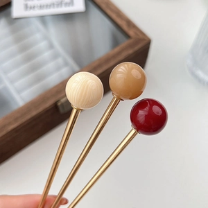Three-piece gold metal hair pins with coffee and cream glass beads for hair styling