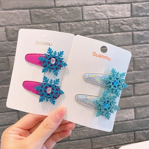 Ice blue snowflake glitter hair clips set for girls featuring sequins and rhinestones